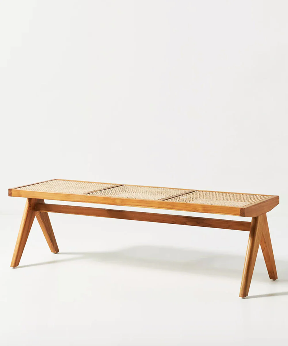 Cane bench showcasing handcrafted rattan weaving and solid Sheesham wood frame by Aesthetic Craft. Cane bench showcasing handcrafted rattan weaving and solid Sheesham wood frame by Aesthetic Craft.