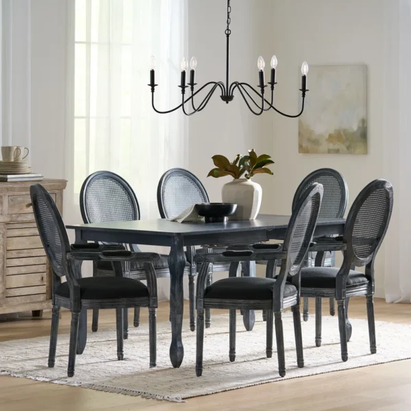 Black 6-person dining table set with wide armchairs and modern styling Aeshteticcraft