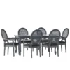 Black 6-person dining table set with wide armchairs and modern styling Aeshteticcraft