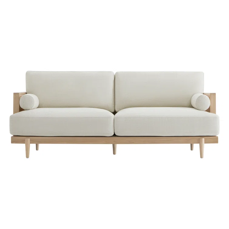 Natural mango wood and cane upholstered sofa with wide cushioned seat Aesthetic craft Natural mango wood and cane upholstered sofa with wide cushioned seat Aesthetic craft