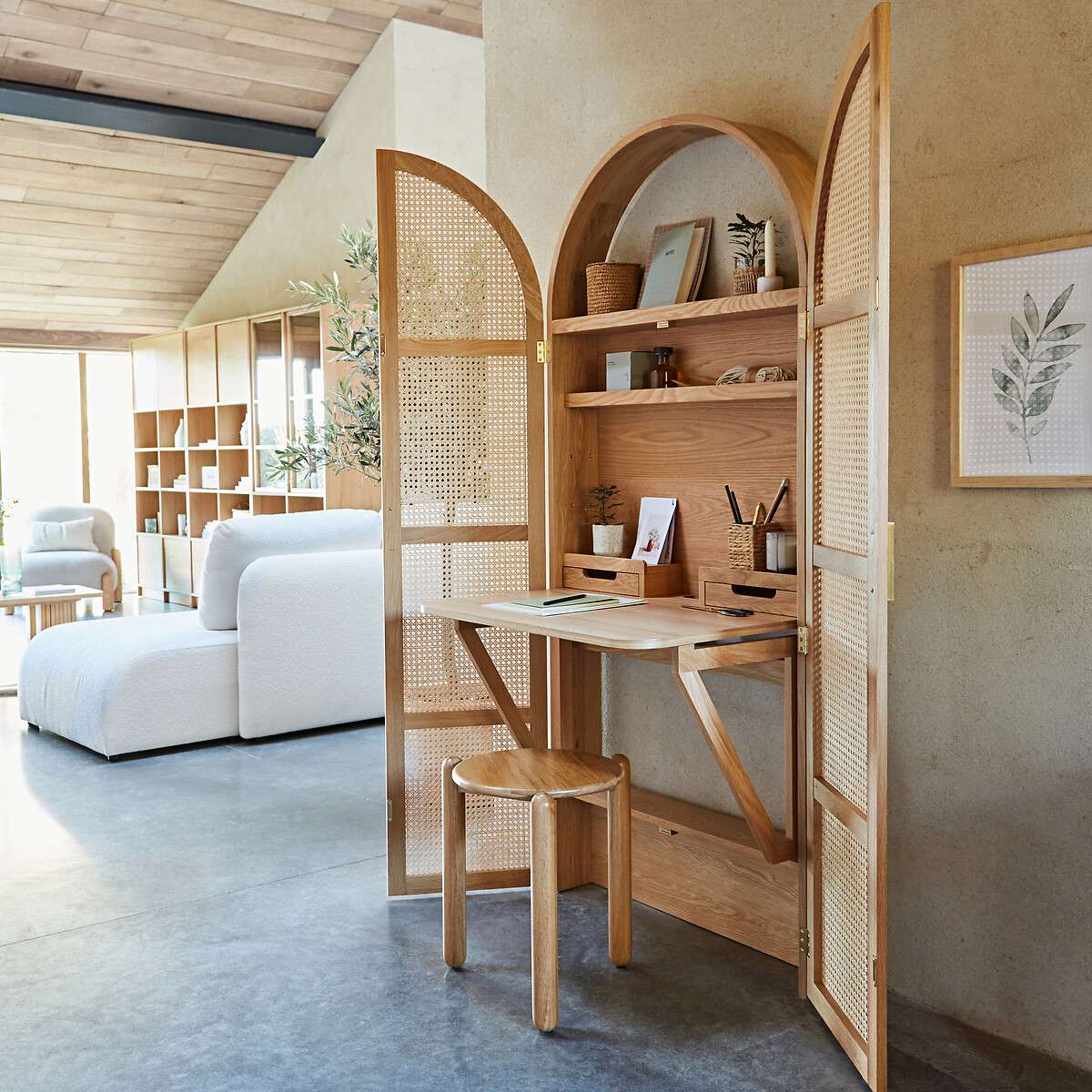 Foldable oak and rattan cabinet desk with brass handles, closed against a wall Aeshtetic craft