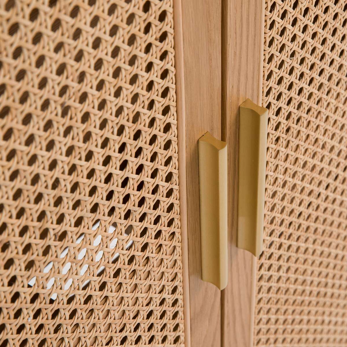 Foldable oak and rattan cabinet desk with brass handles, closed against a wall Aeshtetic craft