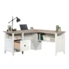 Aesthetic craft L-shaped executive desk with white base, wood top, drawers and shelves for home office use.