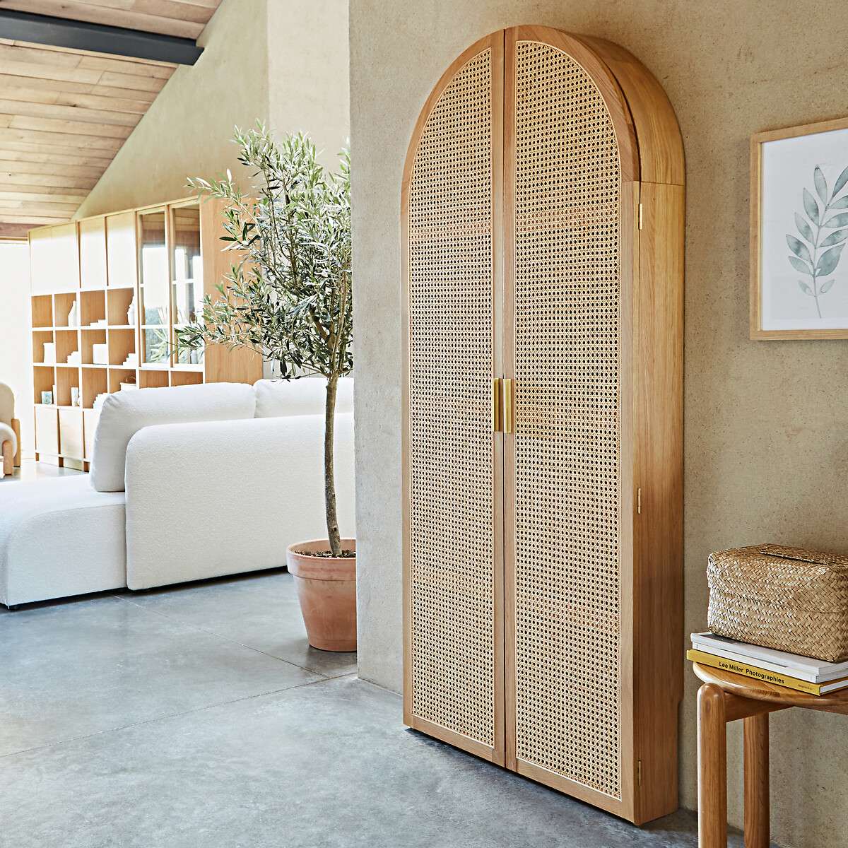 Foldable oak and rattan cabinet desk with brass handles, closed against a wall Aeshtetic craft