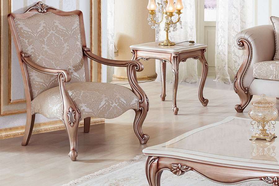 Aesthetic craft Platinum carved mango wood sofa set with armchairs, center table, side tables, TV unit, and decorative pillows Aesthetic craft Platinum carved mango wood sofa set with armchairs, center table, side tables, TV unit, and decorative pillows