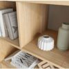 Tall brown wood bookshelf with white drawers and open display shelves for storage and decor Aesthetic craft