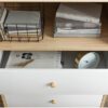 Tall brown wood bookshelf with white drawers and open display shelves for storage and decor Aesthetic craft