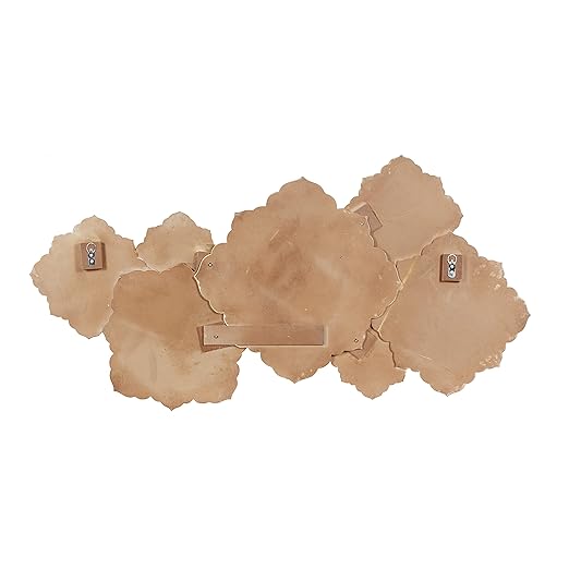 Hand-carved wood wall panel with white floral design, hanging above a sofa in a living room Aesthetic craft