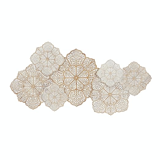 Hand-carved wood wall panel with white floral design, hanging above a sofa in a living room Aesthetic craft
