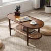 Brown oval coffee table with rattan shelf for small spaces Aesthetic craft