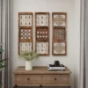 Set of 3 rustic brown wood and metal wall decor panels with intricate carvings and hanging bells, each 36 inches high and 12 inches wide Aesthetic craft