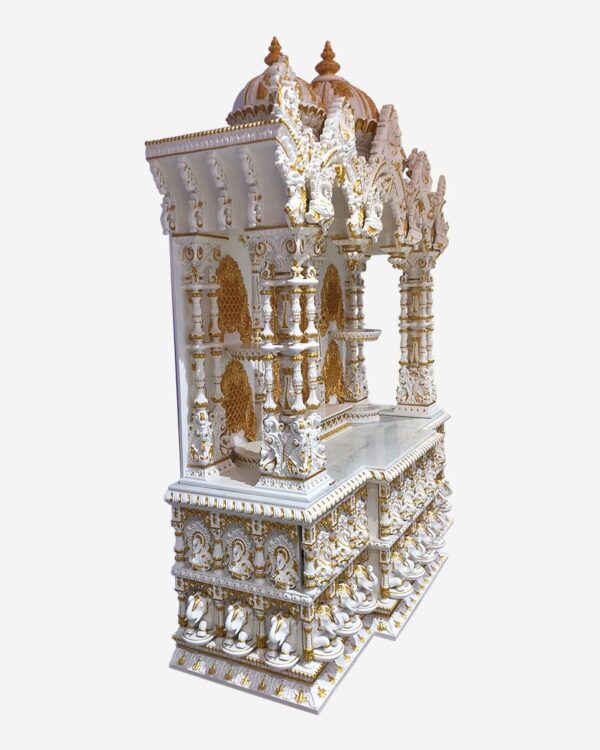 Large handcrafted teak wood mandir in white and gold polish with intricate carvings