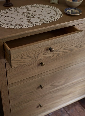 chest of drawers in natural brown finish with 5 spacious drawers