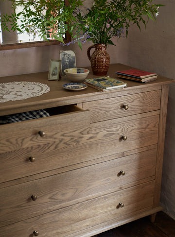 chest of drawers in natural brown finish with 5 spacious drawers