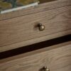 chest of drawers in natural brown finish with 5 spacious drawers