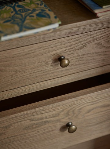 chest of drawers in natural brown finish with 5 spacious drawers