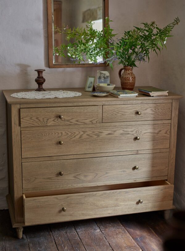 chest of drawers in natural brown finish with 5 spacious drawers