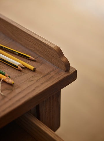 Antique-writing desk with drawer, hand-carved details, and aged oak oil finish