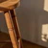 Oval bar stool with 66cm height and sturdy foot rung