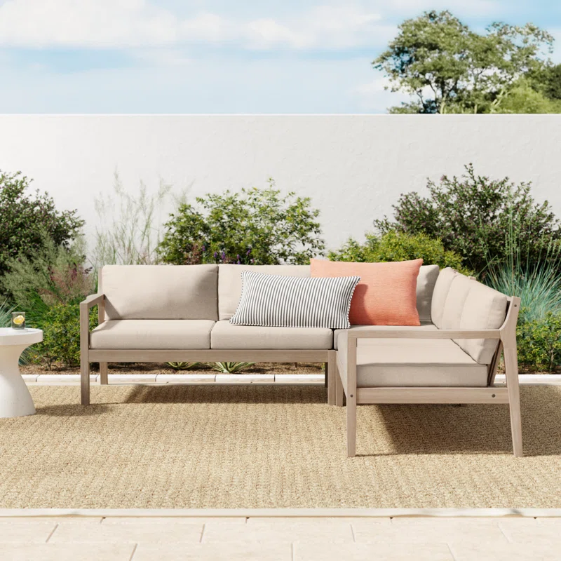 3-piece outdoor L-shaped sofa sectional in natural teak wood with beige olefin fabric cushions 3-piece outdoor L-shaped sofa sectional in natural teak wood with beige olefin fabric cushions