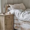 bedside table in natural pine wood with drawer, cupboard, and antiqued bronzed handles