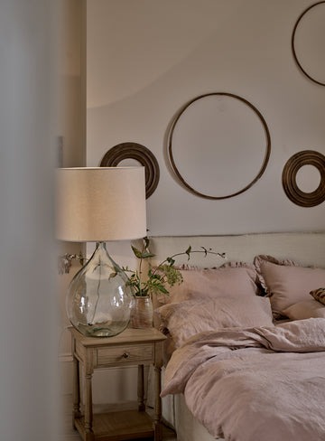 bedside table in natural pine wood with slim drawer, brass hardware, and bottom shelf