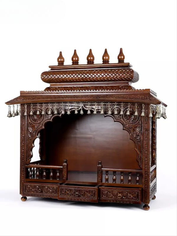 puja temple in dark brown finish with detailed carvings and dangling brass bells