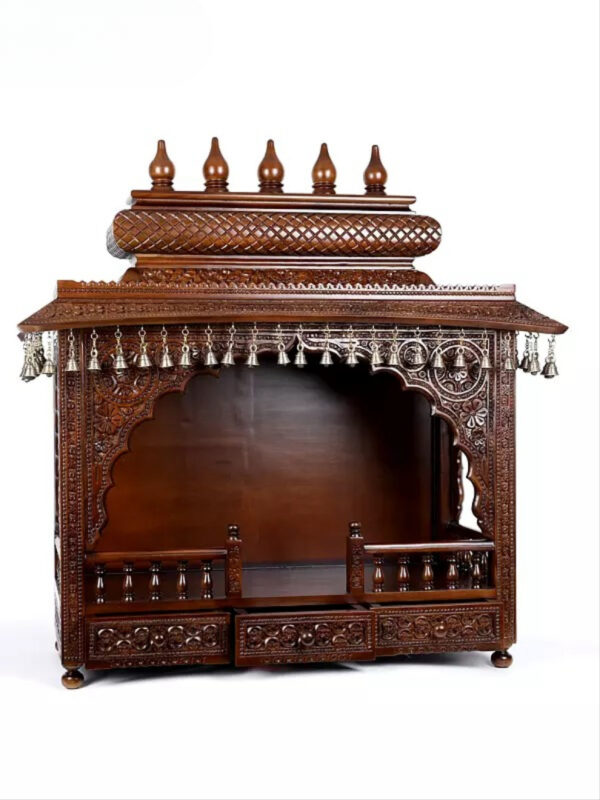 puja temple in dark brown finish with detailed carvings and dangling brass bells