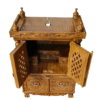 Small traditional wooden mandir in teak wood with natural finish for home worship