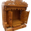 Handcrafted teak wood pooja mandir with peacock carving and doors, high gloss finish