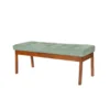 Teak wood dining table set with 4 chairs and 1 bench in brown finish and green cushioned seats.