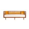 Lounge rattan sofa with woven rattan panels and customizable cushions