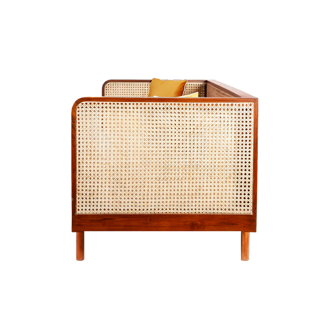 Lounge rattan sofa with woven rattan panels and customizable cushions