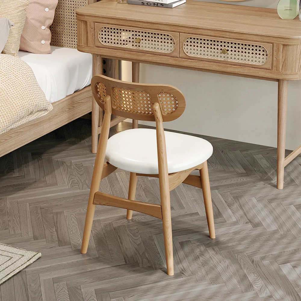 Modern dining table set made of teak wood and cane in walnut finish Modern dining table set made of teak wood and cane in walnut finish