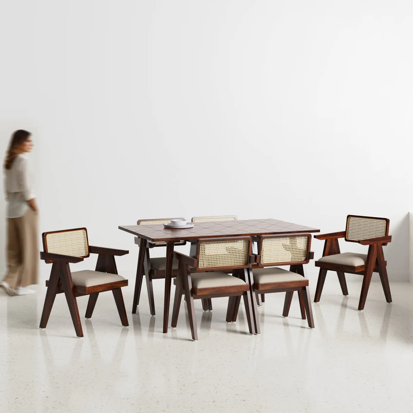 Dining Table Set in dark brown teak wood with Pierre chairs, available in 4 and 6 seater options.