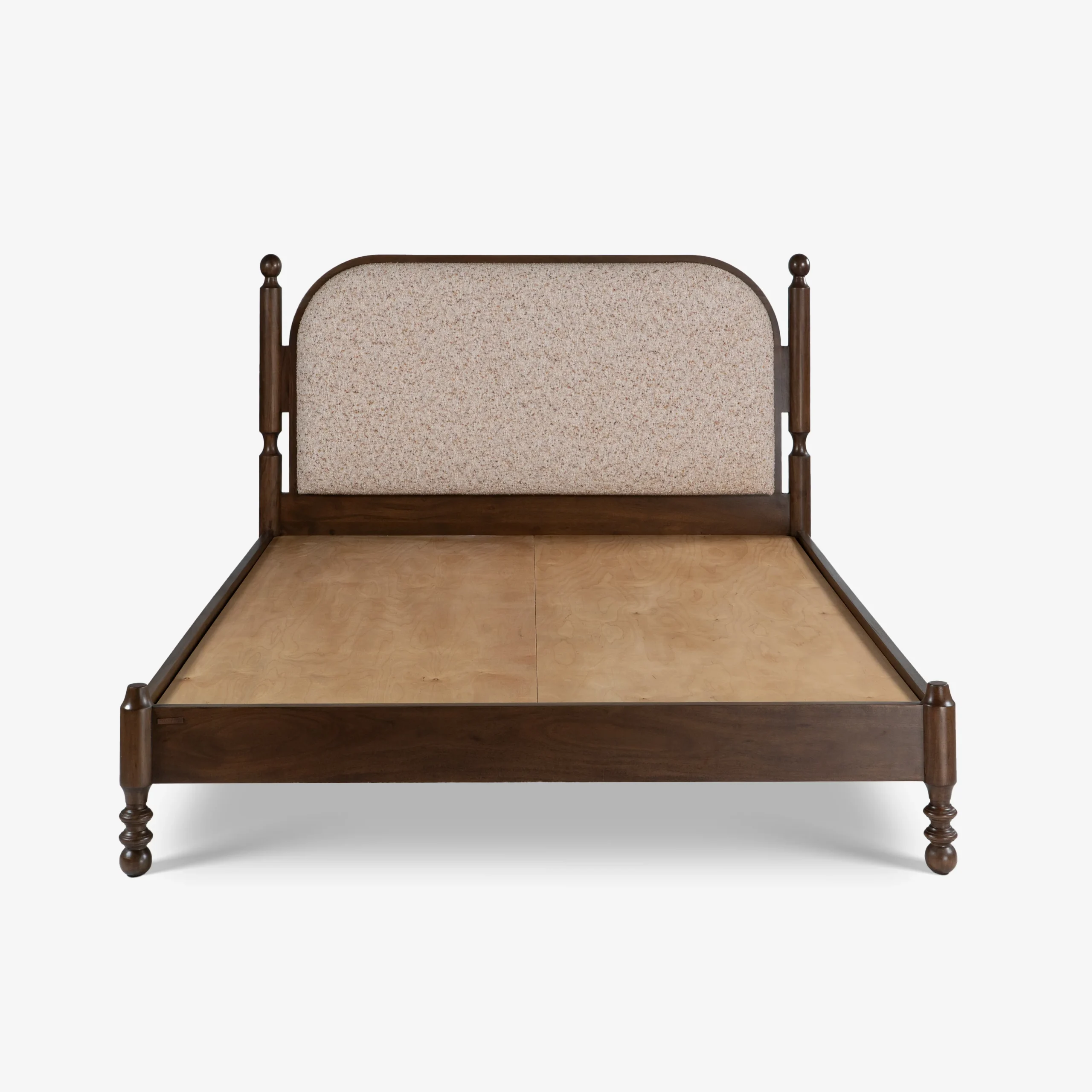 Queen size bed made of solid teak wood in natural finish with upholstered headboard — stylish and durable wooden bed for modern bedrooms.