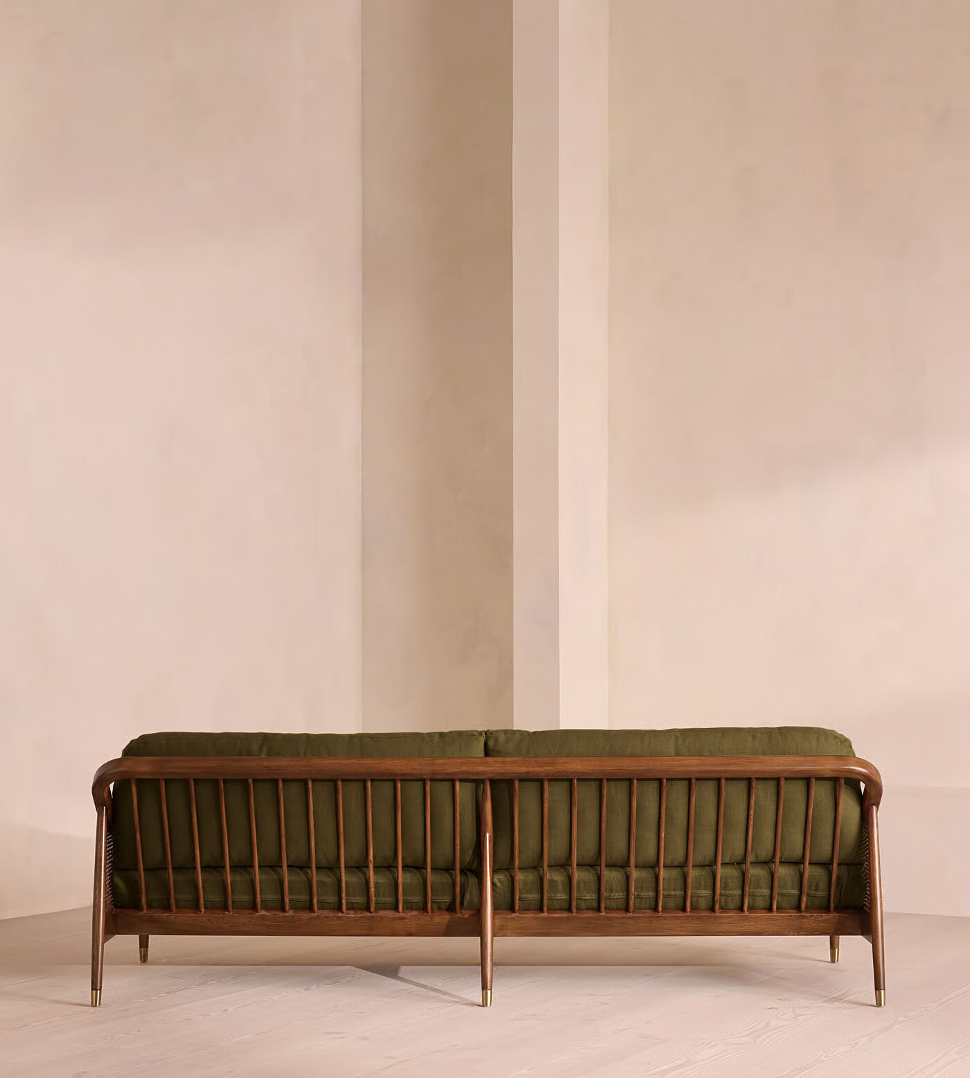 3 seater sofa with teak wood frame, cane sides, and linen upholstery with side pillows