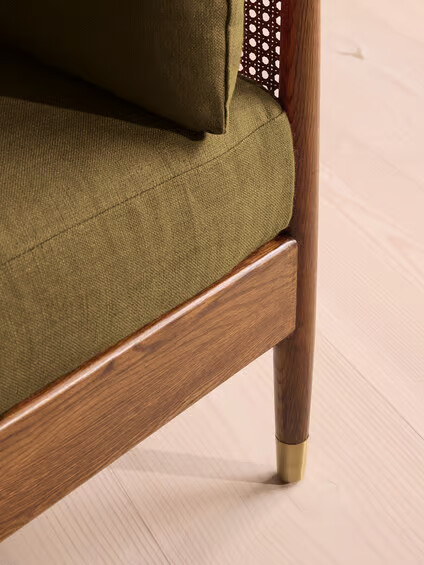 3 seater sofa with teak wood frame, cane sides, and linen upholstery with side pillows