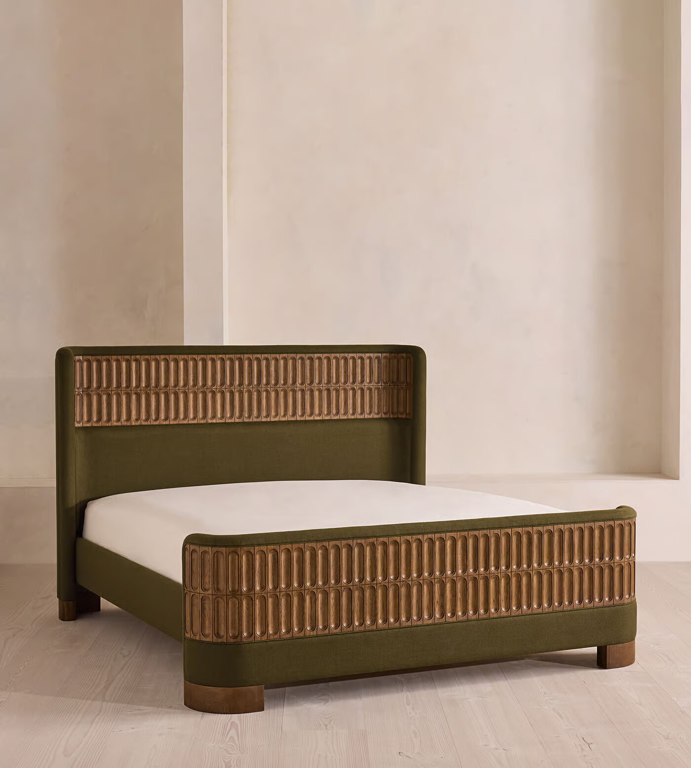 Luxury bed with curved linen headboard and matching footboard Luxury bed with curved linen headboard and matching footboard