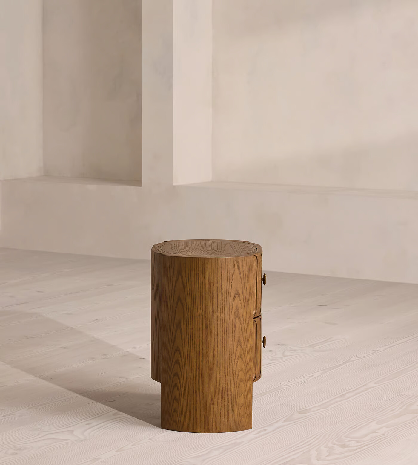 Night stand table with drawer in antique brass finish and pill-shaped grooves Night stand table with drawer in antique brass finish and pill-shaped grooves