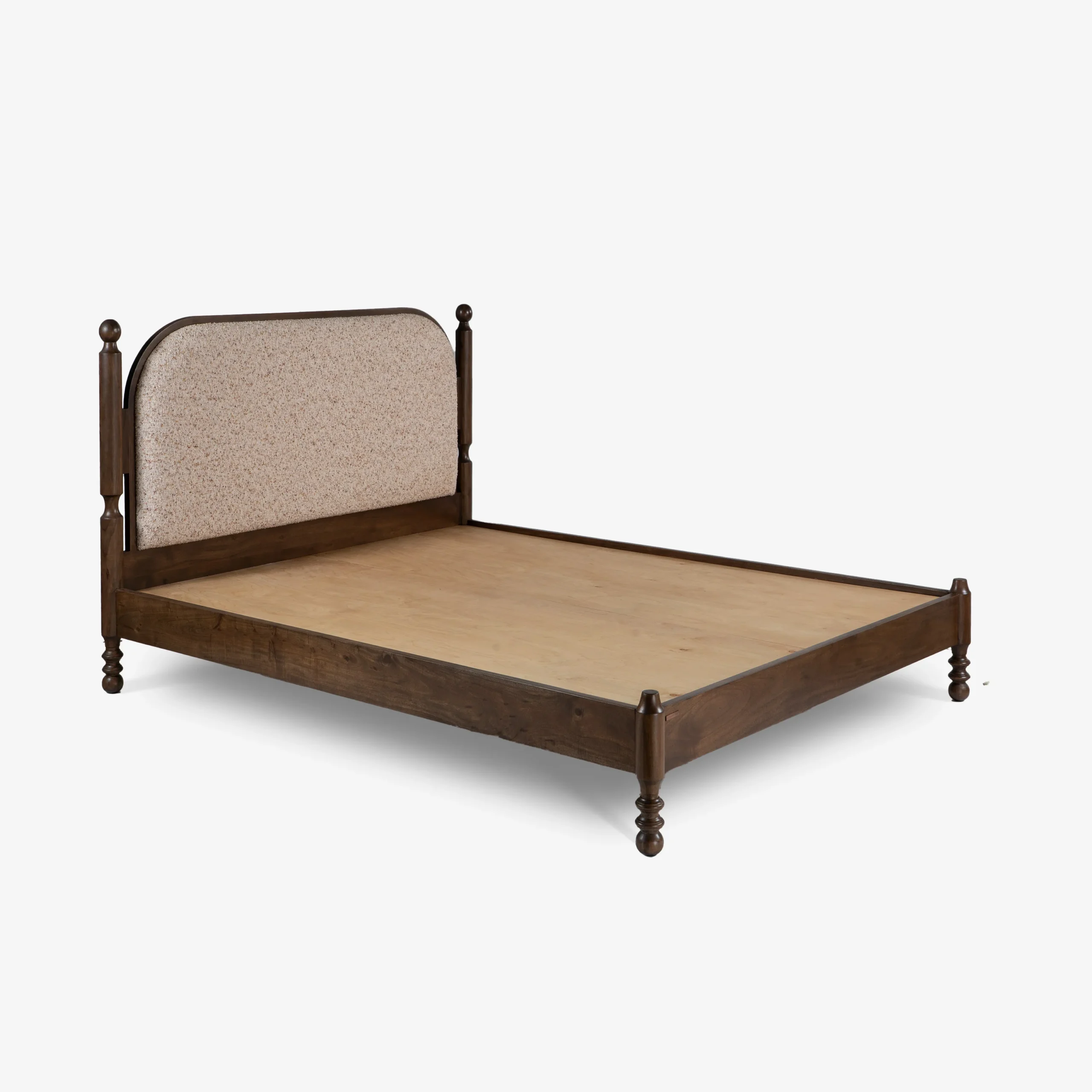 Queen size bed made of solid teak wood in natural finish with upholstered headboard — stylish and durable wooden bed for modern bedrooms.