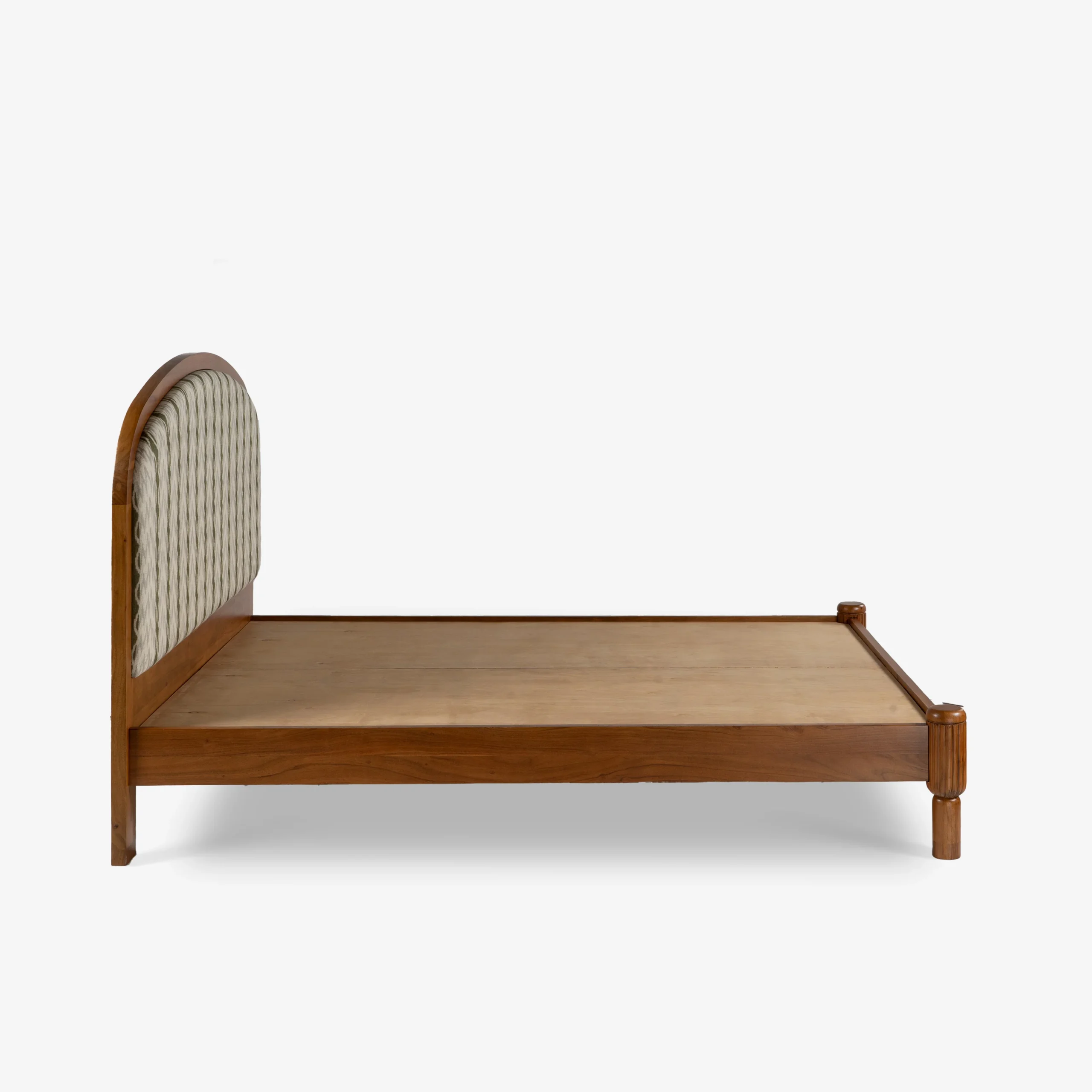 Queen size bed made of solid teak wood in natural finish with upholstered headboard — stylish and durable wooden bed for modern bedrooms. Queen size bed made of solid teak wood in natural finish with upholstered headboard — stylish and durable wooden bed for modern bedrooms.