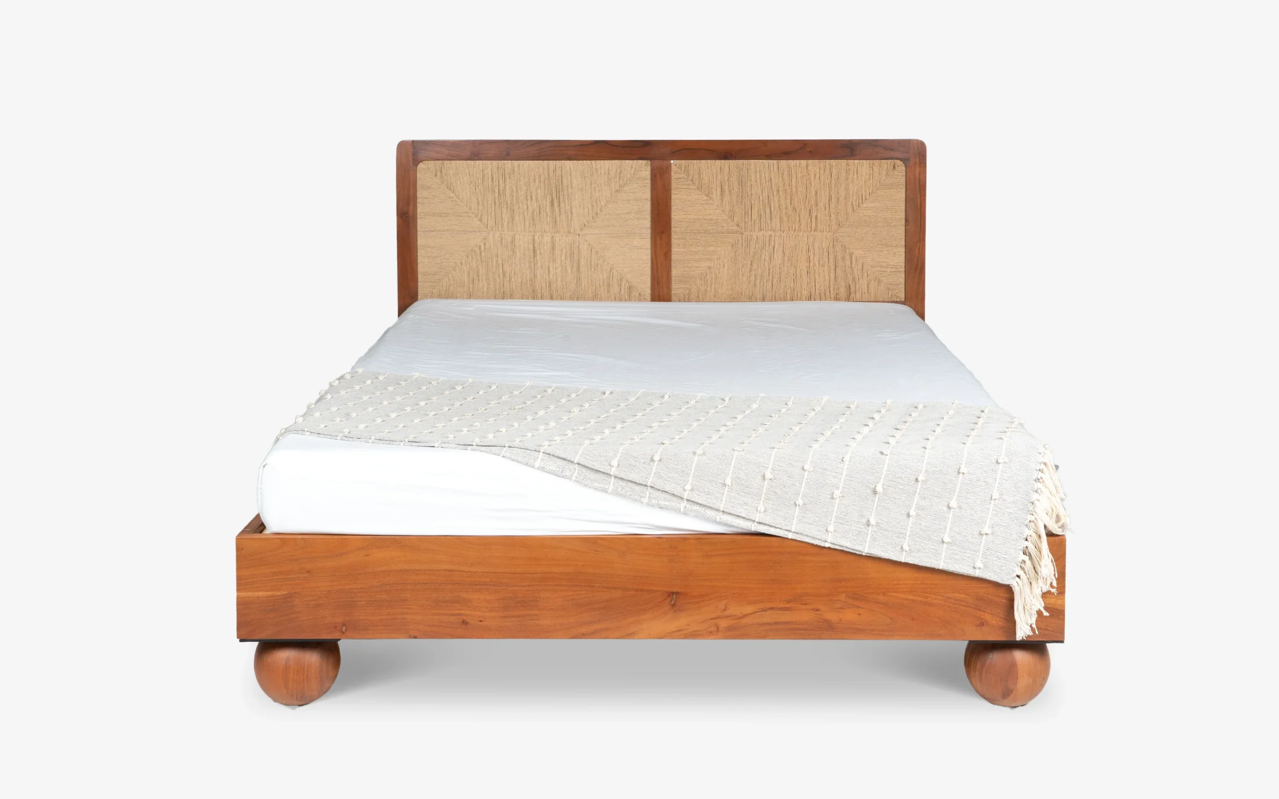 Queen size bed made of solid teak wood in natural finish with upholstered headboard — stylish and durable wooden bed for modern bedrooms. Queen size bed made of solid teak wood in natural finish with upholstered headboard — stylish and durable wooden bed for modern bedrooms.