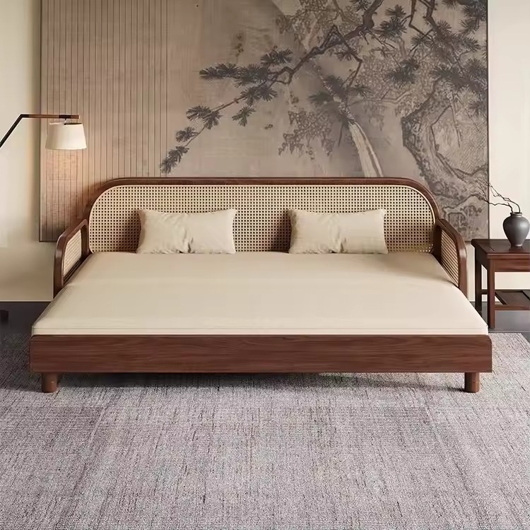 Cane sofa cumbed with teak wood frame, brown finish, soft cushions, and pillows