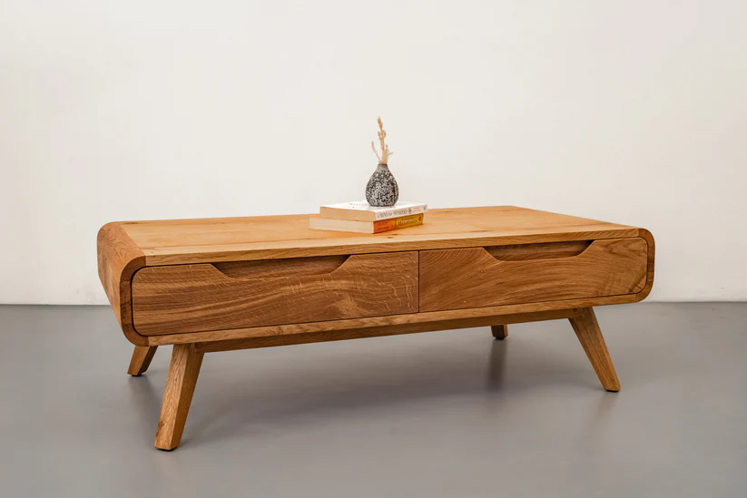 Natural modern coffee table in teak wood with two drawers and natural brown finish Natural modern coffee table in teak wood with two drawers and natural brown finish