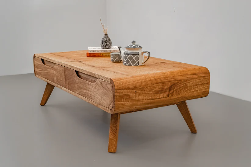 Natural modern coffee table in teak wood with two drawers and natural brown finish Natural modern coffee table in teak wood with two drawers and natural brown finish