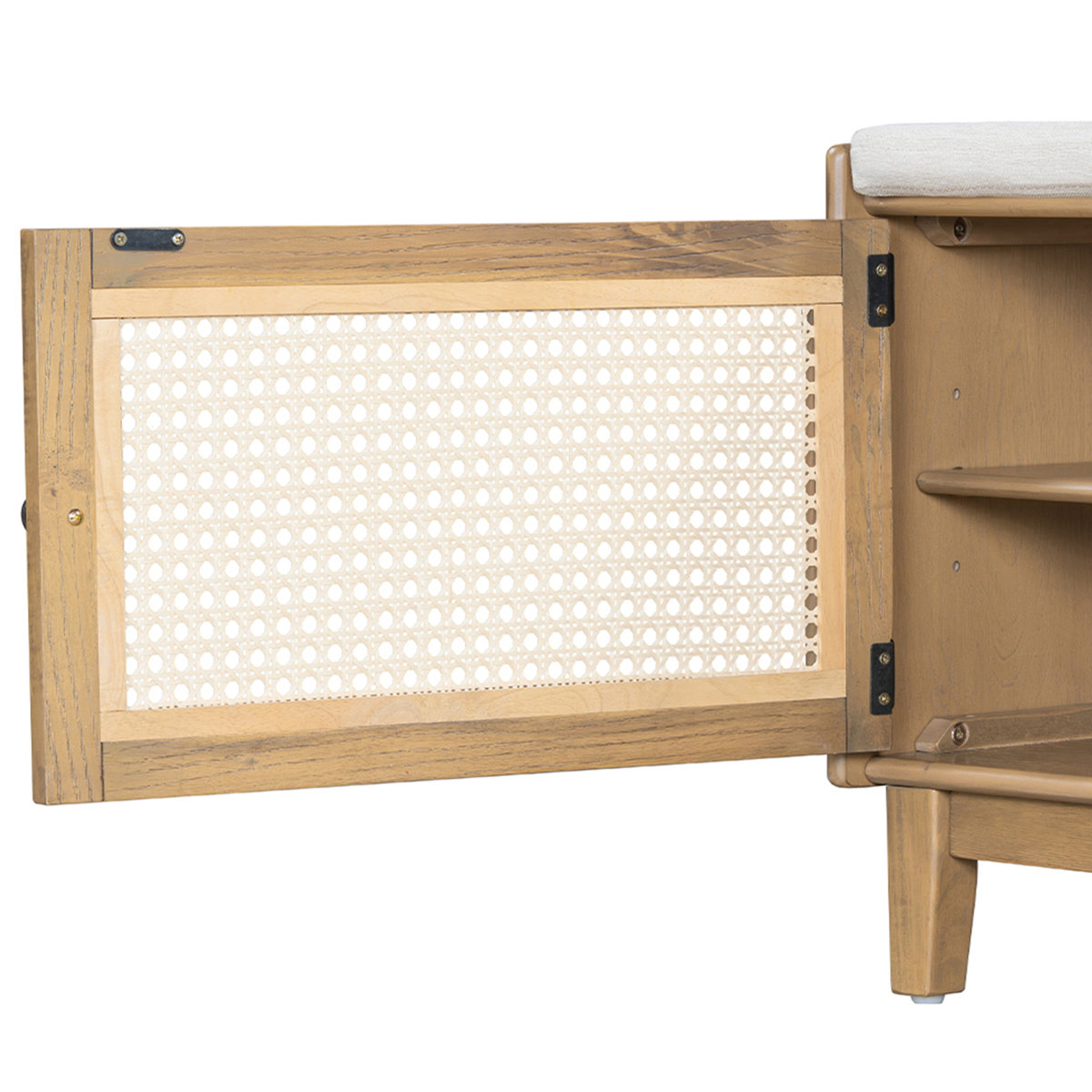 Teak wood shoe bench with natural cane cushion and two storage doors, shown in a modern entryway.