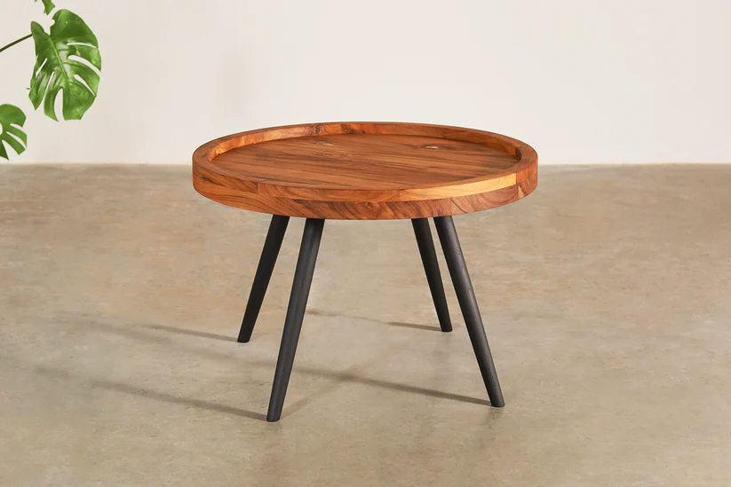 Round coffee table in teak wood with natural brown top and black legs