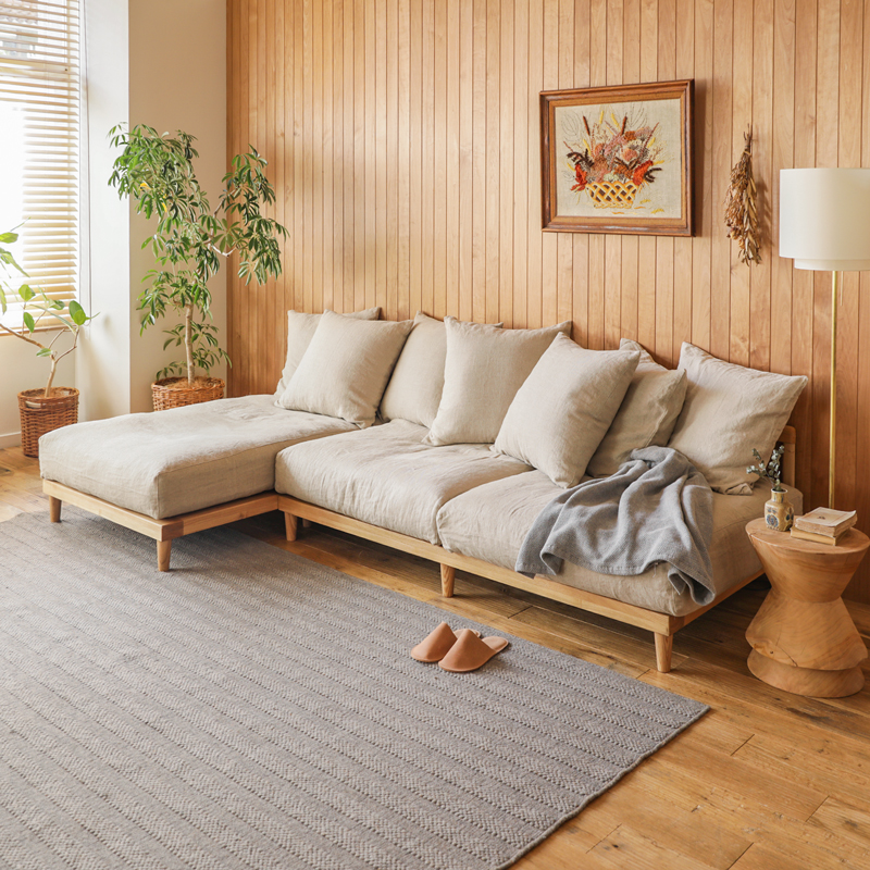 L shaped sofa in teak wood with cotton canvas cushions