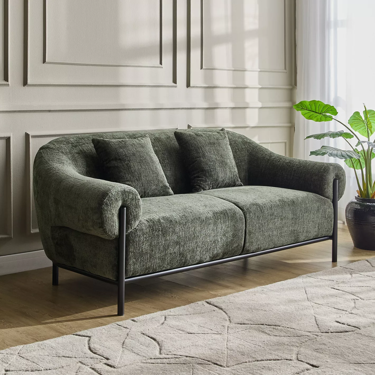 Wooden 2 seater sofa in teak wood with black frame and green upholstery